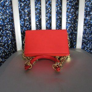 Dagne Dover Coral Clutch